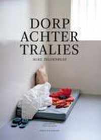 Dorp achter tralies