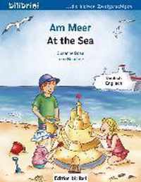 Am Meer. Kinderbuch Deutsch-Englisch