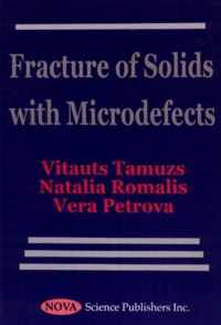Fracture of Solids with Microdefects