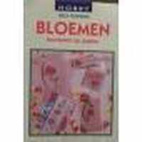 Bloemen borduren op papier