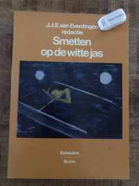 Smetten op de witte jas