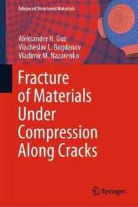 Fracture of Materials Under Compression Along Cracks