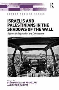 Israelis and Palestinians in the Shadows of the Wall