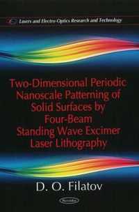 Two-Dimensional Periodic Nanoscale Patterning of Solid Surfaces by Four-Beam Standing Wave Excimer Laser Lithography