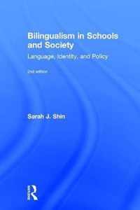 Bilingualism in Schools and Society