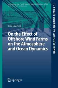 On the Effect of Offshore Wind Farms on the Atmosphere and Ocean Dynamics